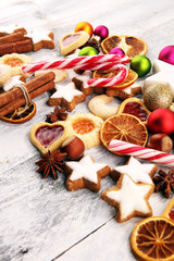 Decoration with christmas cookies. Typical cinnamon stars with fruits and nuts