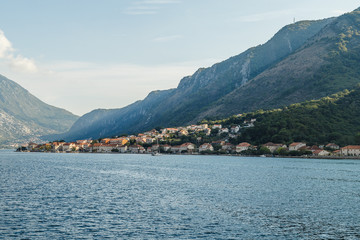Fototapeta na wymiar The city on the beach in the Bay of Kotor in Montenegro