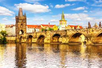 Charles Bridge and view the Tower of Lesser Town of Prague