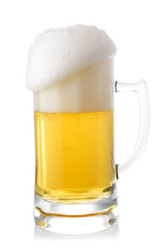 Cold beer in mug isolated on white background.