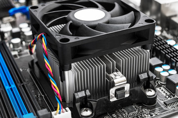 Cpu fan on motherboard. Close up.