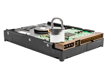 Padlock on the computer hard disk drive. Data security concept.