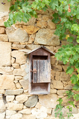 Durat: little post box on wall of farming house (France, Auvergne)