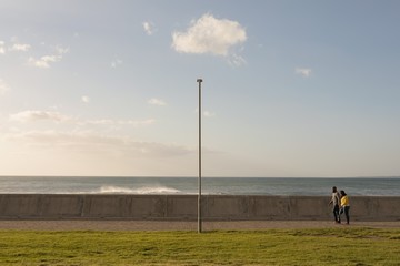 Couple walking on promenade