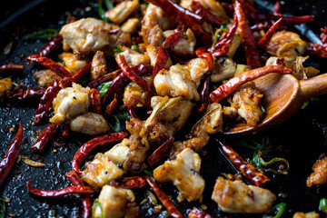 Close up of meat cooking in frying pan