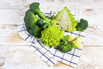 Various of Cabbage Broccoli, Romanesco Cauliflower. Assorted of Cabbages on the kitchen table