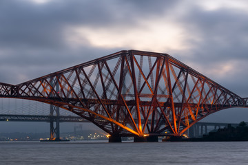 Fototapeta na wymiar Evening view Forth Bridge over Firth of Forth in Scotland