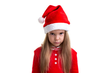 Serious and angry christmas girl wearing a santa hat isolated over a white background