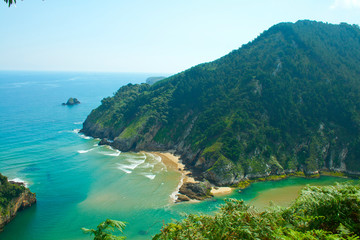 Secluded beach surrounded by amazing cliffs, Estuary of Tina Minor in Cantabria