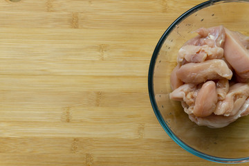 Fresh chicken in bowl