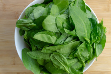 fresh spinach leaves in a bowl