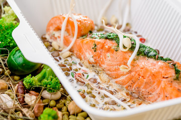 Salmon in cream sauce with lentils and soybean sprouts.
