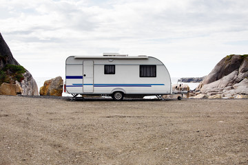 Obraz premium Photo of motorhome on background of mountains ,sky