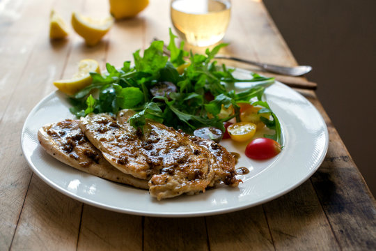 Close up of food served on plate on wooden table