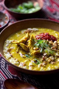Close up of savory rice porridge served in bowl