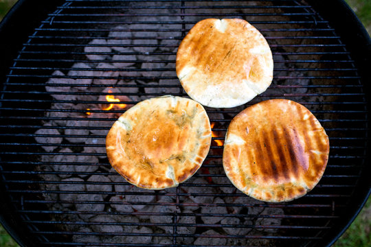 Close up of breads on barbecue grill