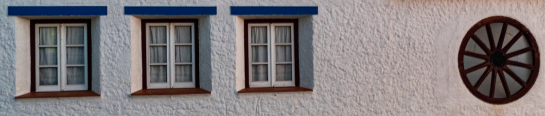 Fototapeta na wymiar three windows typicall house from portugal