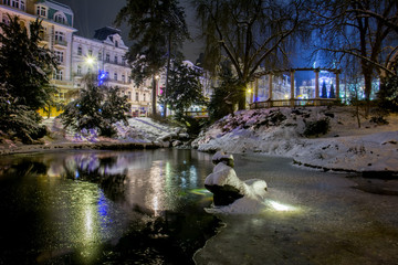 Fototapeta na wymiar Central spa park in winter - Marianske Lazne (Marienbad) - great famous Bohemian spa town in the west part of the Czech Republic (region Karlovy Vary)
