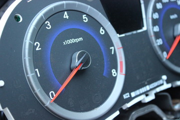 Fototapeta premium The dashboard of the car, the speedometer close-up.Repair of the car, disassembled the panel, the steering wheel.