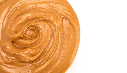 A Bowl of Creamy Peanut Butter on a White Background