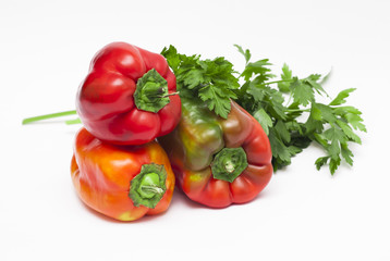 pepper and parsley closeup on a white background