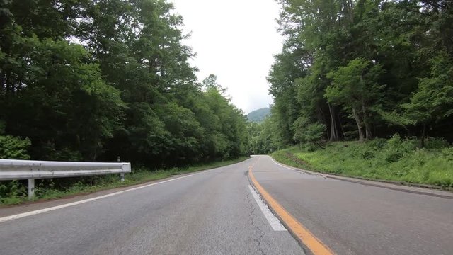 4K POV point of view car driving through highway at Fuji mountain