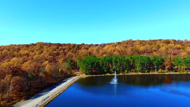 Flying near Turtle Back zoo, flying over water reservation November, autumn afternoon