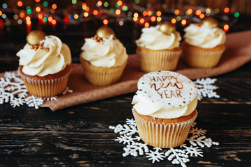 festive dessert cupcakes with new year decor