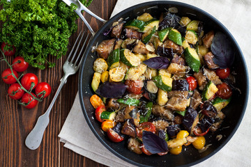 Vegetable bake from zucchini, eggplants, cherry tomatoes