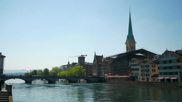 sunny day zurich city center riverside bridge slow motion panorama 4k switzerland
