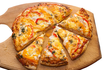 Appetizing pizza cut into pieces on a board isolated on white background