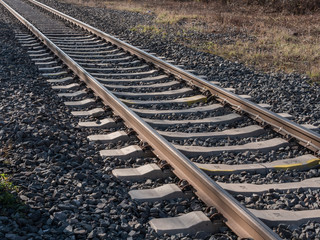 Fototapeta premium railway tracks leading out of picture frame transportation infrastructure