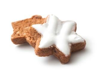 closeup of christmas biscuit in shaped star on white background