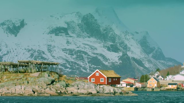 Stunning shot stockfish drying and traditional buildings in Reine, Lofoten