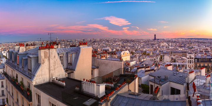 Aerial panoramic view from Montmartre over Paris roofs at nice sunrise, Paris, France