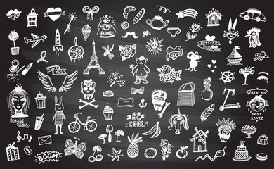 Doodle graphic line elements set on a chalkboard, hand drawn illustration symbols