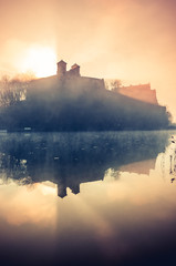 Krakow, Poland, abbey in Tyniec misty sunrise over Vistula river