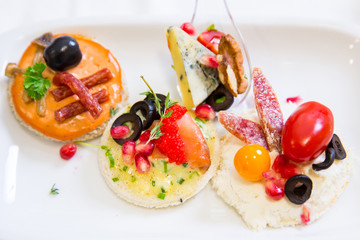 canape with fish, cheese and caviar