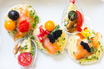 canape with fish, cheese and caviar