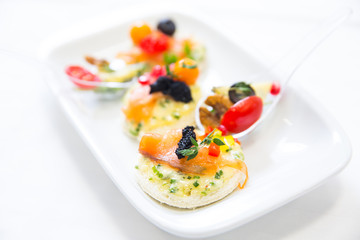canape with fish, cheese and caviar