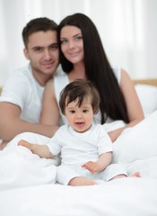 Fototapeta premium Lovely family morning in the bedroom