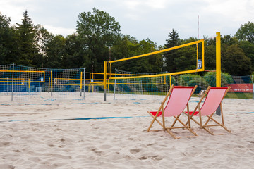 chair referee in the playground on the volleyball beach. Volleyball courts in the background