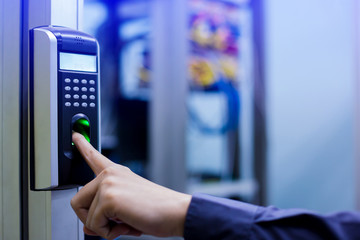 Staff push down electronic control machine with finger scan to access the door of control room or data center.