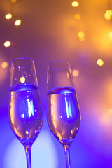 Champagne glass in disco party bar