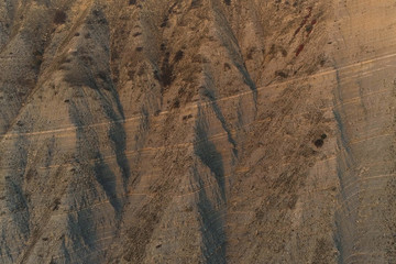 Flying aerial foto of Beautiful view of huge mountain rock at sunset.