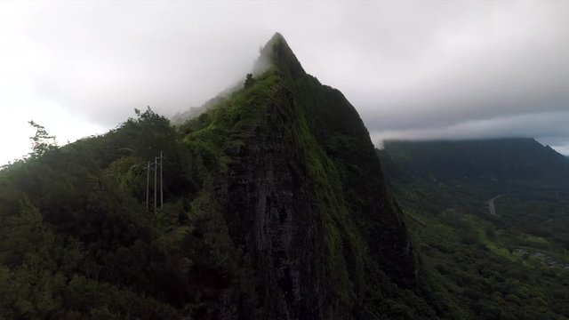 Drone flying up the trail to the Pali Puka in Oahu, Hawaii.