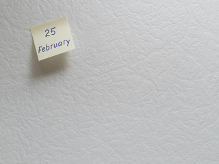February 25, calendar date sticky note