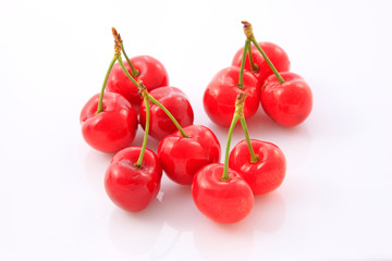 Mature large American cherry on a white background