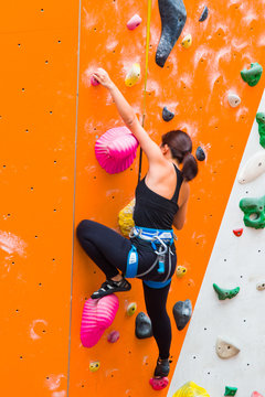 Woman Rock Climbing
