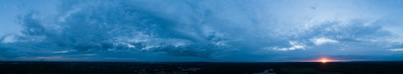 Naklejka na ściany i meble Aerial Panoramic view of dramatic Sky